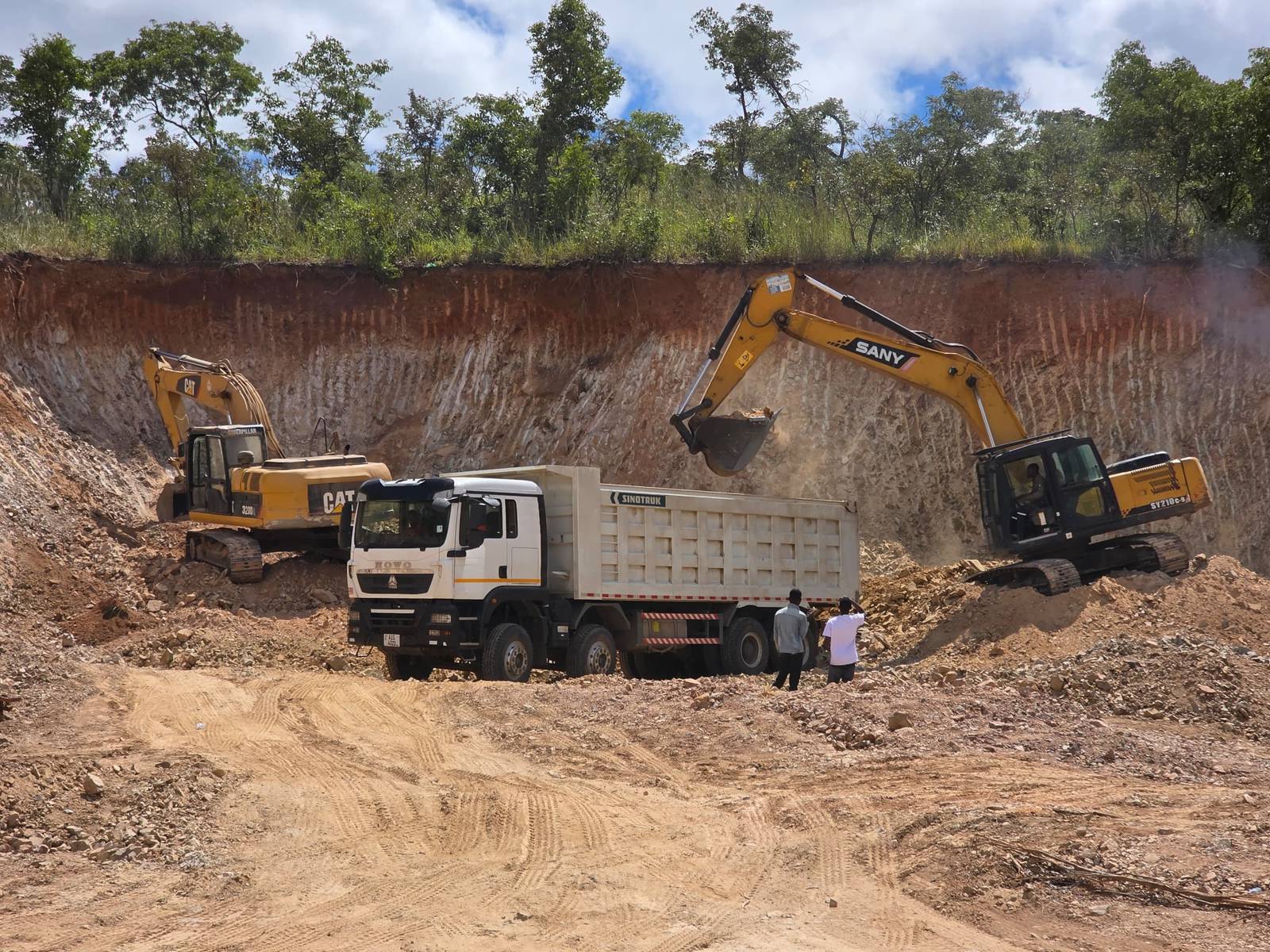 Heavy equipment fleet in Zambia - ZAM Africa Earthmovers ZAM Africa Earthmovers heavy equipment fleet at work on a project site in Zambia